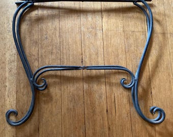 Soporte plegable vintage de hierro forjado