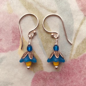 Ea-5 Blue earrings, solid sterling silver wire-wrapped, silverplated brass bead caps, dangle, choice of earring findings. Forget-me-not