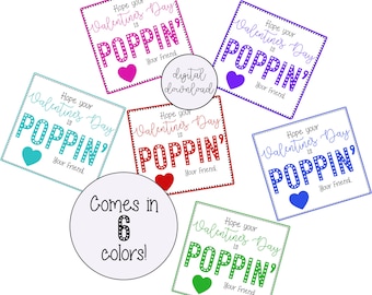 May include: Six printable Valentine's Day gift tags with the text "Hope your Valentine's Day is POPPIN'" in different colors. Each tag features a heart in a different color: pink, blue, red, green, purple, and teal.