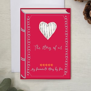 Tarjeta romántica con forma de libro: portada de libro con tarjeta del día de San Valentín en color rosa intenso: la historia de nosotros