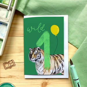 Biglietto di auguri per il primo compleanno "Wild One" con tigre, palloncino e grande numero 1
