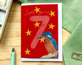 Seventh birthday card “Super! You're 7” with kingfisher, balloons and big number seven