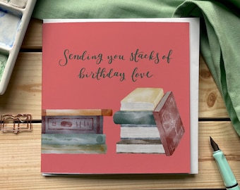 Book birthday card, “Sending you stacks of birthday love” bright pink card for bookworm avid reader