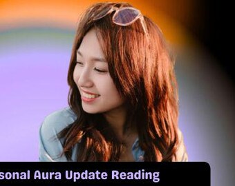 May include: A person with long brown hair and glasses resting on their head, smiling against a soft, circular gradient background of purple, blue, and orange. The text at the bottom reads Seasonal Aura Update Reading in white font.