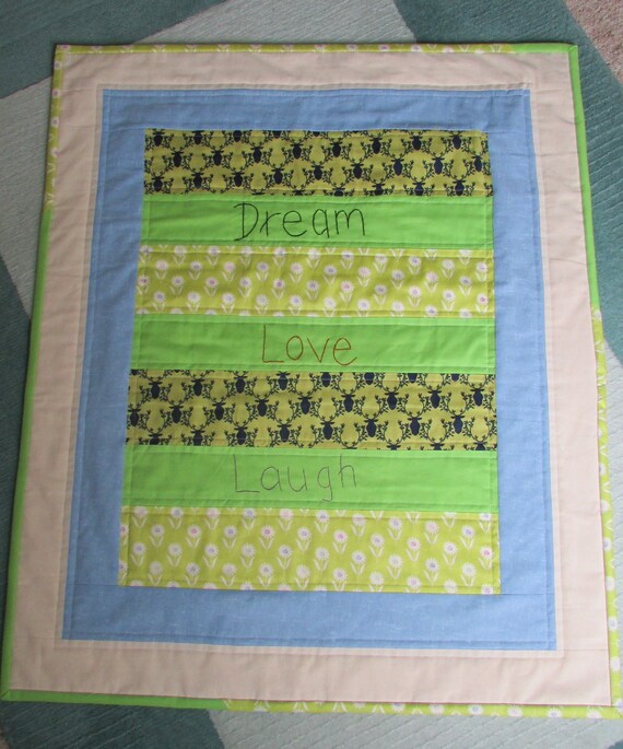 Baby quilt / playmat with lovely hand embroidered words Etsy