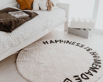 Round woven carpet Happiness