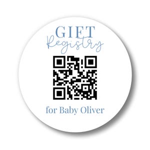 May include: A white circular sticker with the text "GIFT Registry" in a light blue script font. A black and white QR code is in the center. Below the QR code is the text "for Baby Oliver" in a light blue font.
