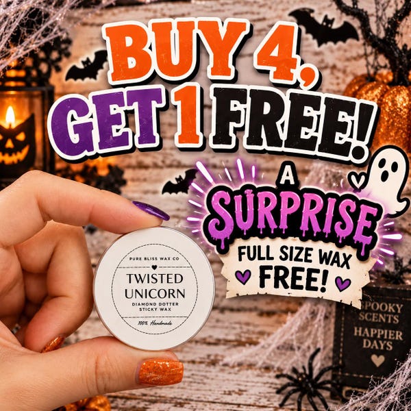 May include: A small, round, white container of Pure Bliss Wax Co. Twisted Unicorn diamond dotter sticky wax. The label features black text, a small heart icon, and the words 100% Handmade. The container is held against a Halloween-themed background.