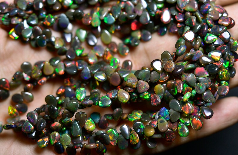AAA-Flashy Black Ethiopian Welo Opal Smooth Pear Briolettes-8 inches Strand-Stones measure-6x4.50-7x5mm-B3545