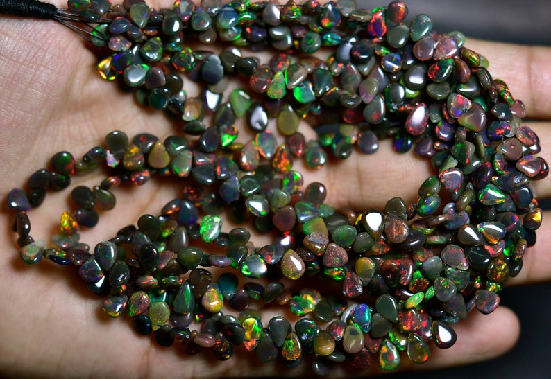 AAA-Flashy Black Ethiopian Welo Opal Smooth Pear Briolettes-8 inches Strand-Stones measure-6x4.50-7x5mm-B3545