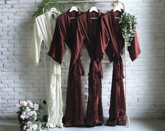 Really long Bridesmaid robes in super smooth soft silky satin, front back personalized with gold silver for the Bride and the Bridal party.