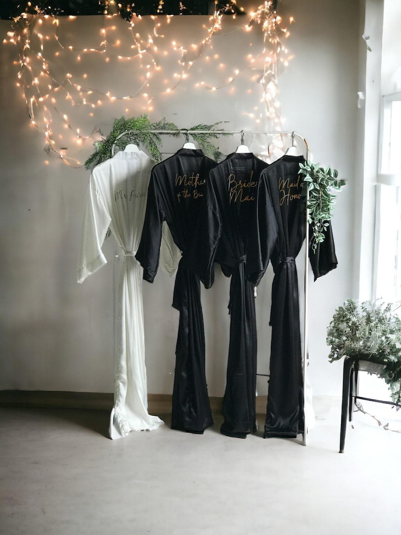 Long black personalized satin bridesmaid robes with front and back gold text. Custom gifts for Mother of the Bride, Groom and Bridal party. image 1