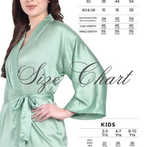 a woman in a green robe is standing in front of a white background