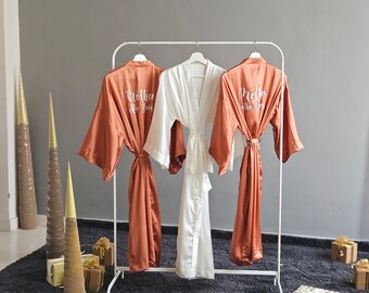 Bridesmaid robes in long ankle lengths and personalized. Burnt orange, sage, mauve, dusty blue, emerald green, blush pink and white.