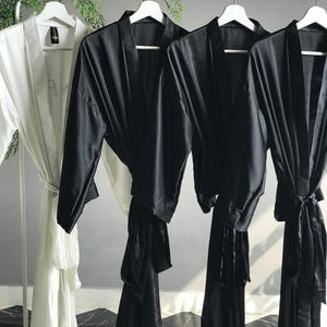 Long black personalized satin bridesmaid robes with front and back gold text. Custom gifts for Mother of the Bride, Groom and Bridal party. image 5