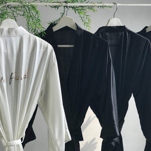 Long black personalized satin bridesmaid robes with front and back gold text. Custom gifts for Mother of the Bride, Groom and Bridal party. image 4