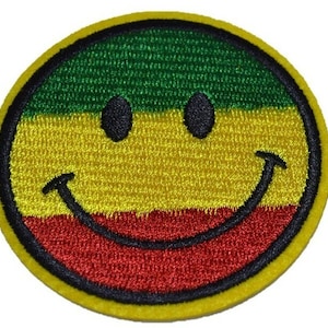Parche bordado con plancha y signo de la paz rasta reggae de Groovy Hippie sonriente
