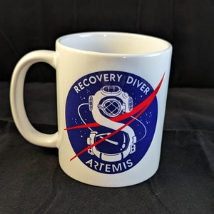 US Navy Recovery Force Diver NASA Artemis space program white glossy mug