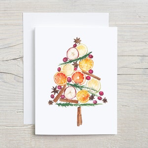 May include: A watercolor illustration of a Christmas tree made of dried fruit, spices, and greenery. The tree is decorated with orange and lemon slices, cranberries, cinnamon sticks, and star anise.