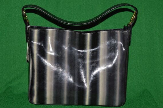 gray patent leather purse