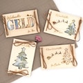 Personalized Christmas money gift · Wooden wish fulfiller · Gift packaging for money · Individual Christmas gift B2 product logo