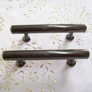 Italy Brass handles in high quality.polished handle black nickel.Pulls black nickel length mm.105 Diam. mm. 12 cm hole spacing.6,4.art.582 image 1