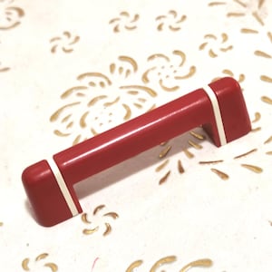 Italy Plastic handles in high quality.polished red handles.Plastic red. red. length mm.75. hole spacing. mm.64.art.2123