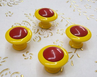 Italy Brass knobs in high quality.knob yellow lacquered brass with red insert.yellow and red knob.Diam.mm.30,base mm.17,height mm.24.art.192