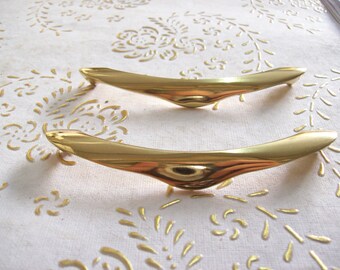 art.594 9,6 polished handle gold 8 cm hole spacing Italy Brass handles in high quality handle gold.Pulls gold length mm.111 diameter mm