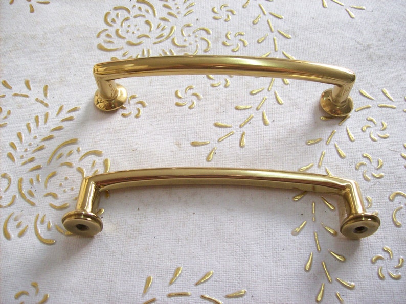 art.594 9,6 polished handle gold 8 cm hole spacing Italy Brass handles in high quality handle gold.Pulls gold length mm.111 diameter mm