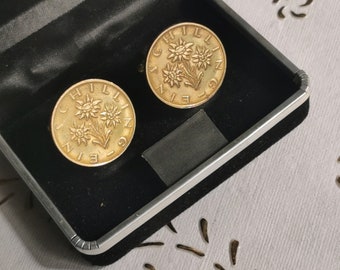 Abotoaduras vintage de 1990 com moedas da sorte da Áustria. 2 moedas genuínas de 1 xelim. Flor de Edelweiss da sorte. 22. 35º aniversário, 35º aniversário. art.312