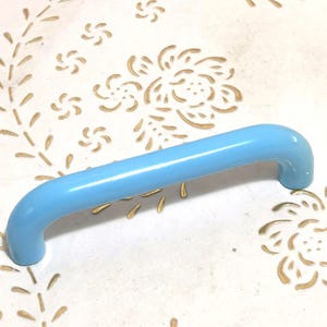 Italy Plastic handles in high quality.polished light blue handles.Plastic light blue. light blue. length mm.108. hole spacing.mm.96.art.2109