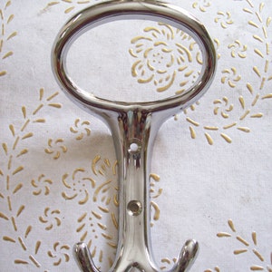 Vintage Italy High quality polished chrome iron wall hooks. Coat hooks. hangers, hooks. polished chrome hooks. Italian designer.