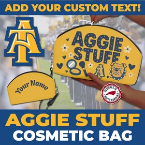 May include: A yellow cosmetic bag with the text "AGGIE STUFF" and a bulldog graphic. The bag also features a smaller version with the text "Your Name". The design includes flowers, hearts, and a makeup brush and mirror. The words "Designed in North Carolina" are also visible.