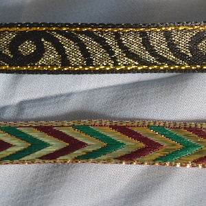 Gold and Black Ribbon.  A Jacquard Chevron Style with maroon, Green and Gold or a woven  Black Swirls with Gold.