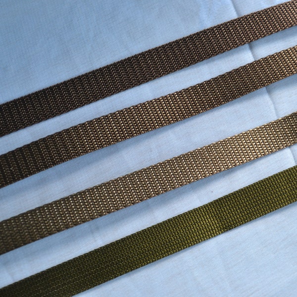 nylon web, 1/2" wide Brown, Golden Brown, Tan and Olive Drab.  100% Nylon Webbing.  All lovely standard weight nylon.