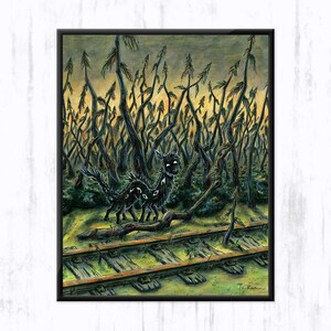May include: A framed painting depicting a dark, multi-eyed creature standing near a fallen log and weathered railroad tracks. The background features a dense, eerie forest of thin, spindly trees under a muted, yellowish-grey twilight sky.