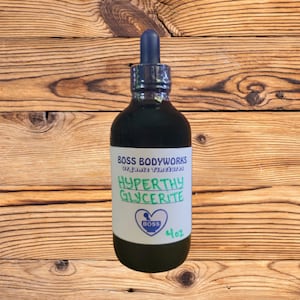 May include: A dark brown glass bottle with a blue dropper top. The bottle is labeled "BOSS BODYWORKS Organic Tinctures HYPERTHY GLYCERITE" with a small heart logo that says "BOSS" and "4 oz".