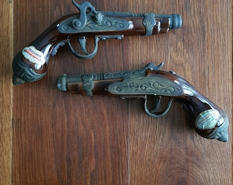 Rare vintage duo of Barsottini Vino Rosso ceramic glass gun musket shaped wine bottles