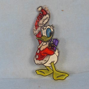 Vintage. Walt Disney -Donald Duck Holding A Gift Stained glass Christmas Ornament
