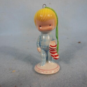 Vintage-Joan Walsh Anglund-Boy Holding A Red and White Stocking