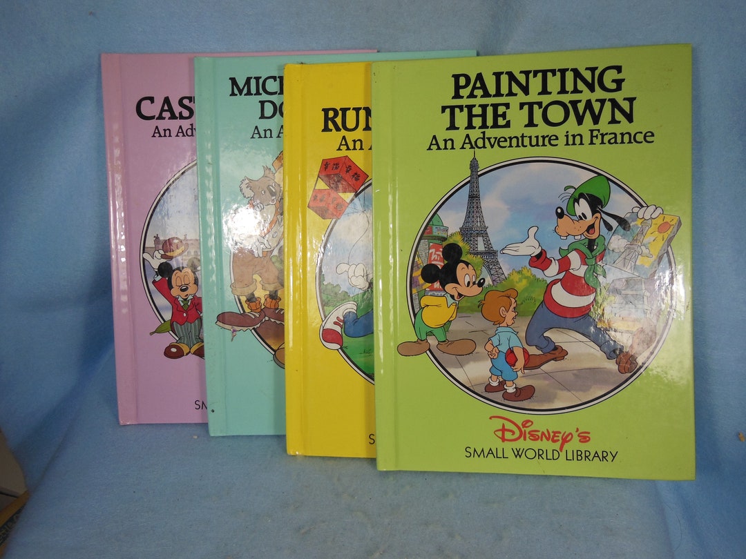Vintage walt Disneys 4 Small World Library Books with Disney 