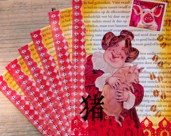 May include: A stack of red and white patterned paper cards with a red and white lace border. The cards feature a colorful illustration of a woman holding a piglet. The text "猪" is printed in black on the cards.