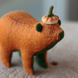 May include: A set of three ceramic mugs with a speckled, matte finish. The mugs are in shades of cream, light gray, and dark gray. Each mug has a simple, minimalist design, perfect for coffee or tea.