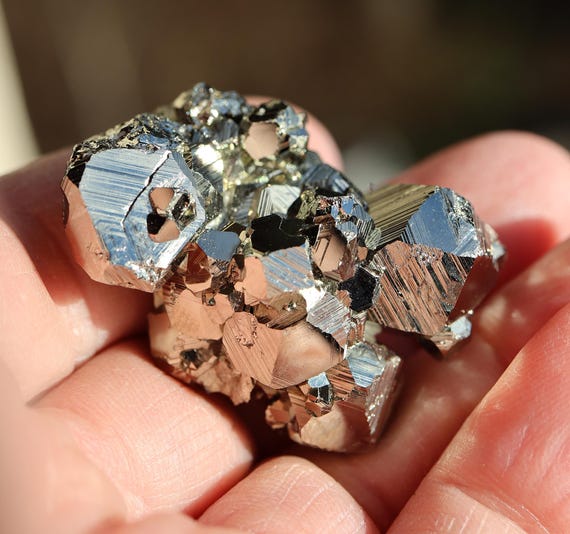Lustrous Octahedral Pyrite Crystal chain. Huanzala mine, Ancash, Peru