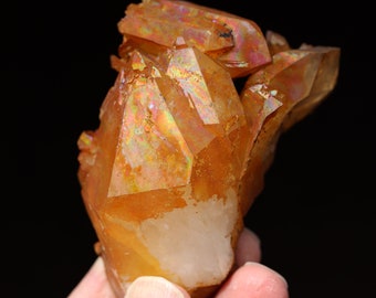Natural iridescent iron surface Quartz crystal. Collier Creek, Arkansas. Complete crystallized floater.