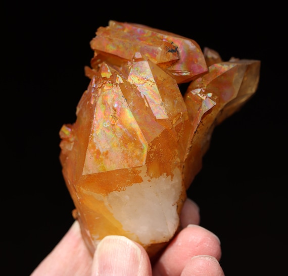 Natural iridescent iron surface Quartz crystal. Collier Creek, Arkansas. Complete crystallized floater.