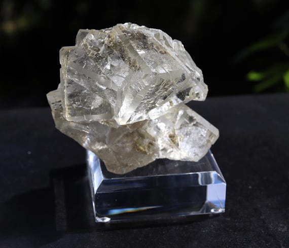 A clear Fluorite fan cluster with large cube modified corners. Dalnegorsk, Primorski Krai, Russia. Cabinet specimen