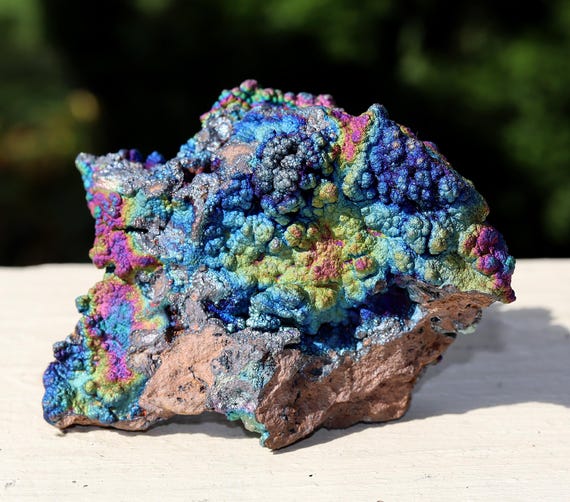 Iridescent Turgite (Hematite/Goethite). Pahang, Malaysia. Hand clean and prepped cabinet ready. Quality stand included.