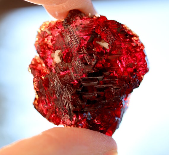 Lustrous Spessartine Garnet. 111 grams. Navegadora claim, Penha do Norte, Conselheiro Pena, Minas Gerais, Brazil